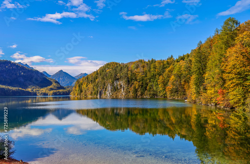 The Alpsee is a lake in the Ostallg  u district of Bavaria  Germany  located southeast of F  ssen. It is close to the Neuschwanstein and Hohenschwangau castles. 