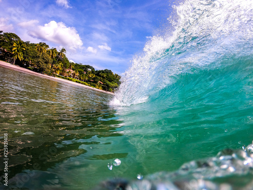 Green wave and tube, Costa Rica photo