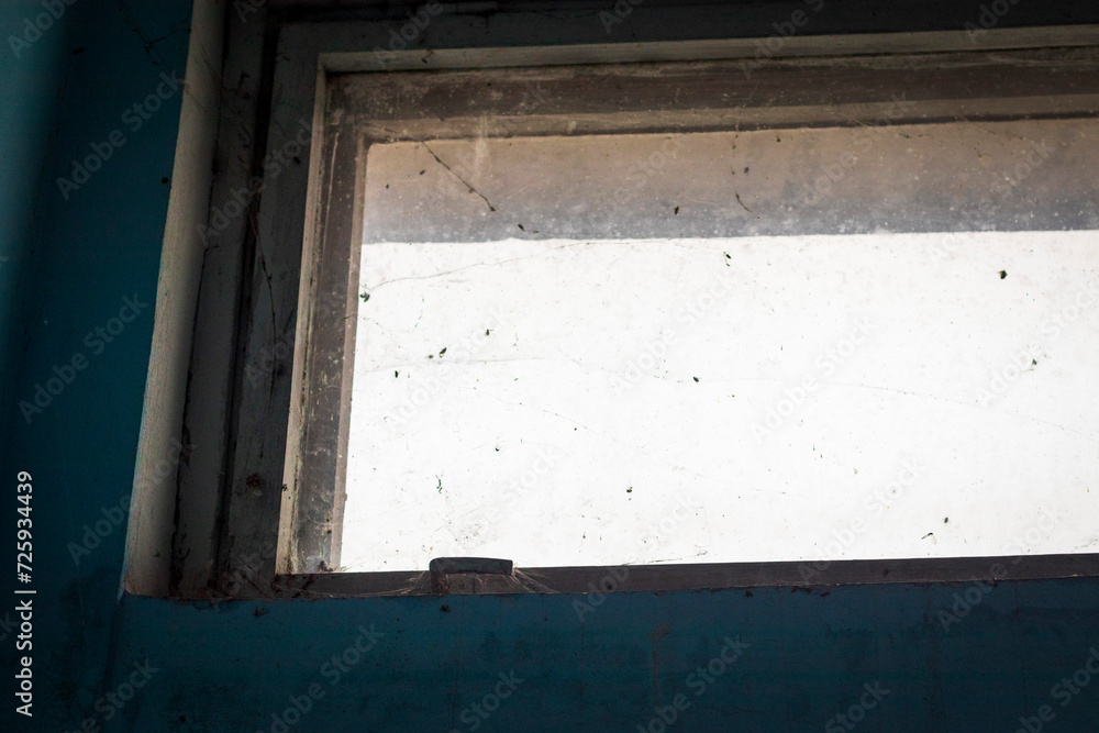 Shot of the old wooden window in the soviet era corridor in the building. Concept