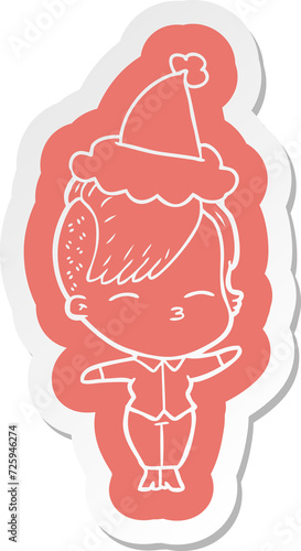 cartoon sticker of a squinting girl wearing santa hat