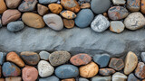 Assorted stones encircling a blank centre stone creating natural frame for text. 