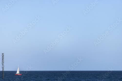 sailboat to blue sea and blue sky copy space