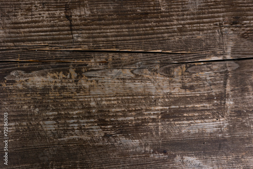 Texture of an old wooden log with a crack. Wooden background.