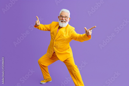 Joyful elderly gentleman expressing fun with a fashionable outfit. Generative AI.
