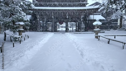 Heavy snow at deserted entrance to temple at Amanohashidate in Kyoto, Japan
