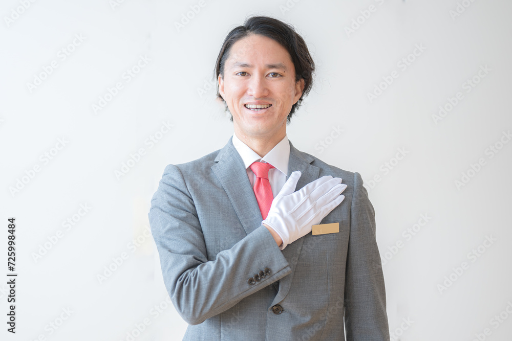 白手袋をしたスーツ男性 白手袋をしたスーツ男性