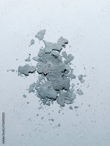 Silver chloride (AgCl) darkened from light, the product of the reaction of silver nitrate with sodium chloride, decanted and dried.