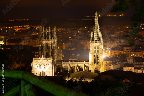 Night aerial cityscape of Burgos with Our Lady Cathedral, Spain photo