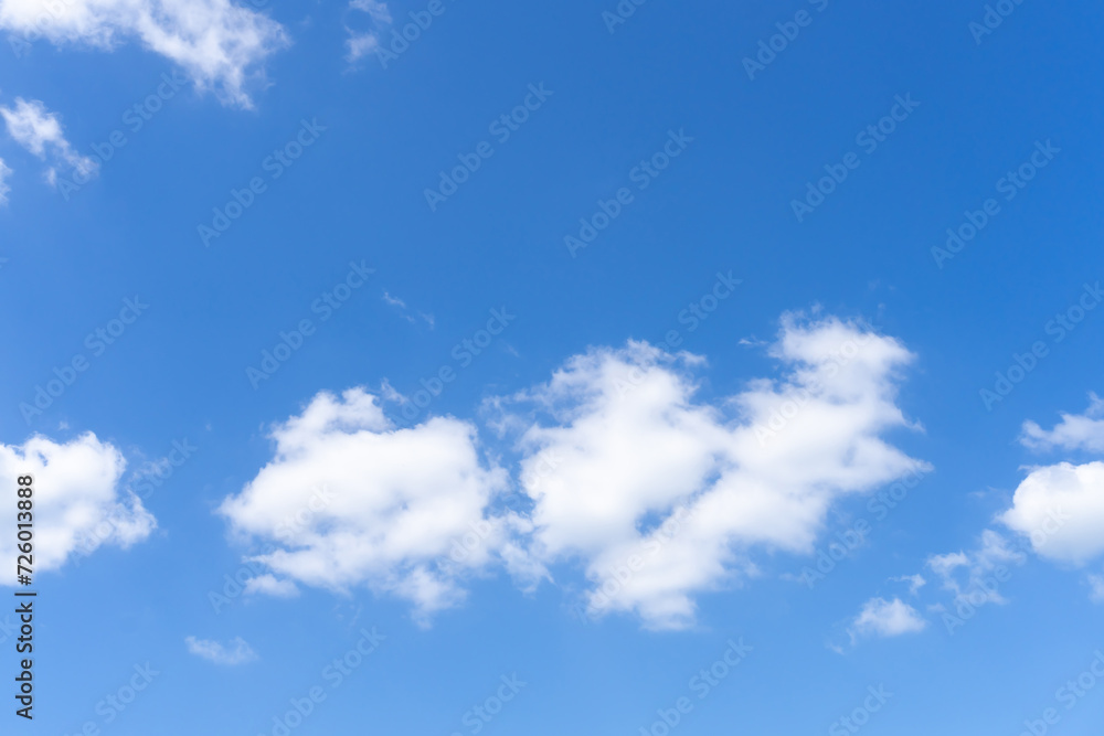 Beautiful blue sky with strange shape of clouds in the morning or evening used as natural background texture in decorative art work Beautiful blue sky with strange shape of clouds in the morning or evening used as natural background texture in decorative art work
