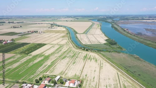 beautiful drone view of a river and some roads in the grado's laggon photo
