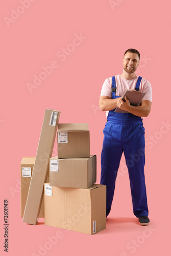 Male courier with clipboard...