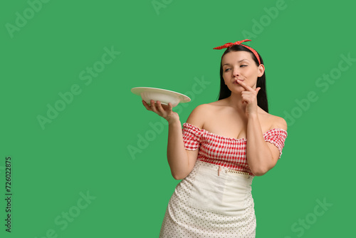 Thoughtful young waitress w...