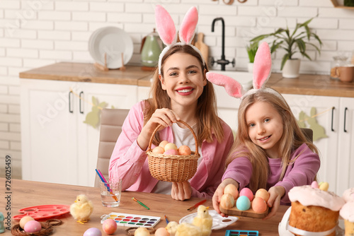 Happy mother and daughter d...