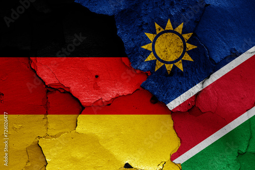 flags of Germany and Namibia painted on cracked wall