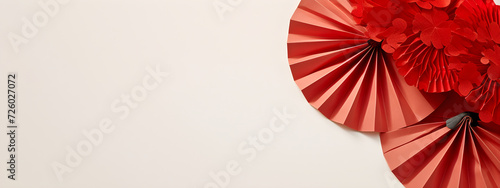 Festival red paper fans and blossom flowers on white  background. Happy Chinese New Year. Spring floral banner in traditional japanese style