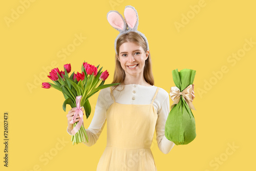 Young woman in bunny ears w...