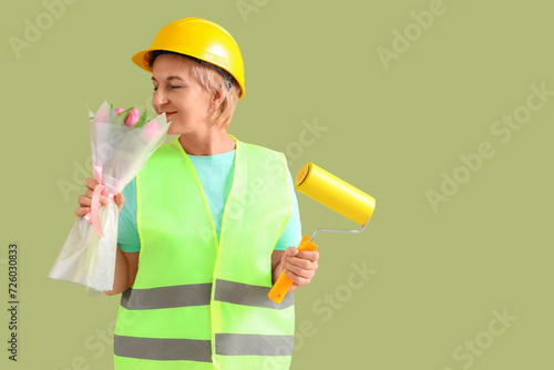 Mature female worker with t...