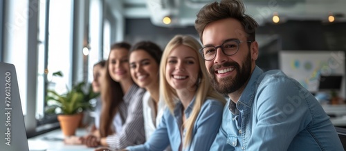 Bright office break: Smiling work team.