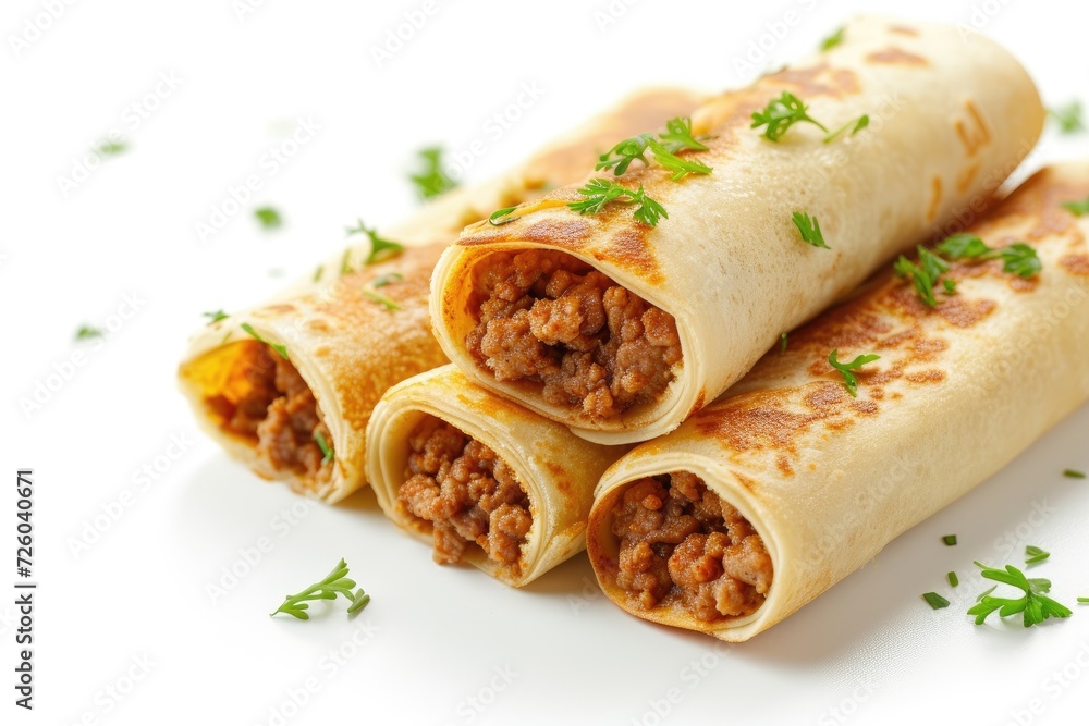 High resolution image of pancake rolls filled with ground meat isolated on a white background