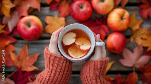 cozy autumn scene with warm apple cide photo