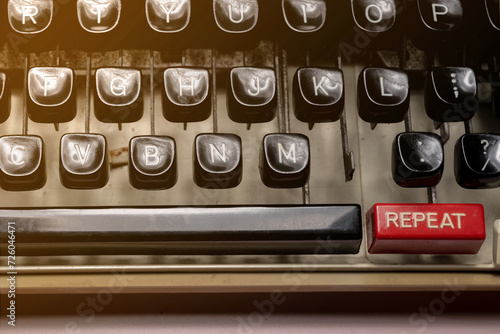 Text of repeat on a vintage typewriter button