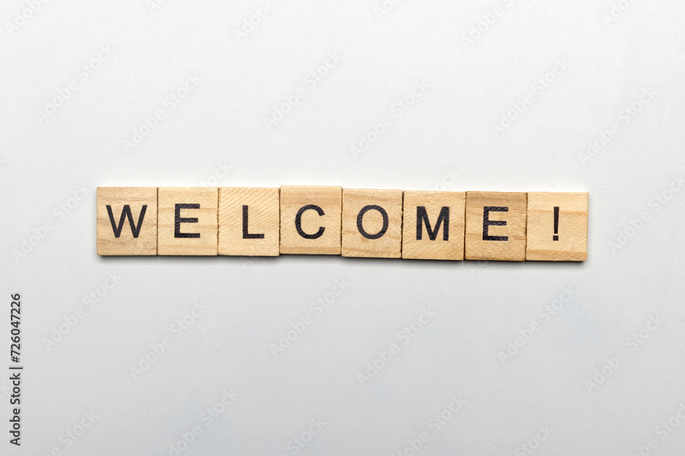 A row of wooden cubes with welcome text A row of wooden cubes with welcome text