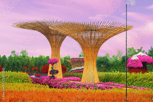 Wooden frame domes amid colorful flowers in garden