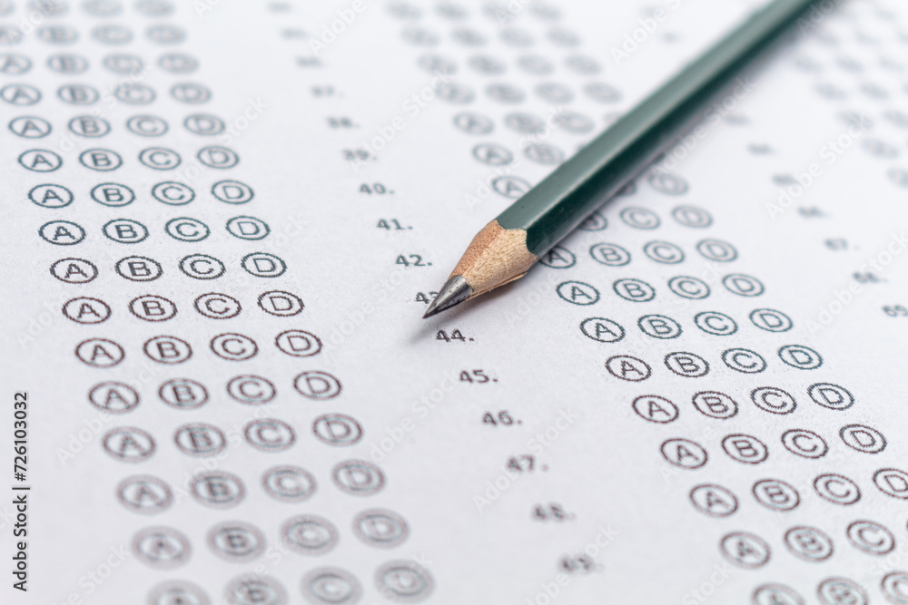 Answer sheet for a test with a pencil, concept for public exams and entrance exams. Answer sheet for a test with a pencil, concept for public exams and entrance exams.