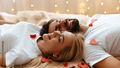 Couple. Love. Valentine's day. Man and woman are lying together and smiling