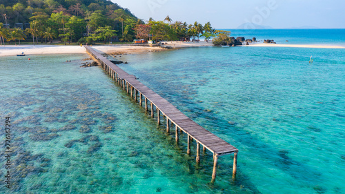 A wooden bridge spanning the beautiful sea  Koh Kham  Thailand