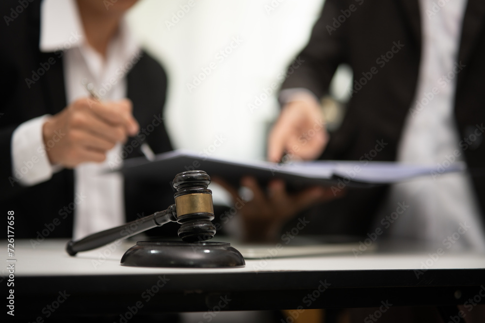 Judge gavel with Justice lawyers having team Concepts of Law and Legal services Judge gavel with Justice lawyers having team Concepts of Law and Legal services