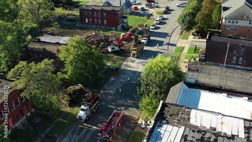 Witness the controlled demolition transforming a construction site.