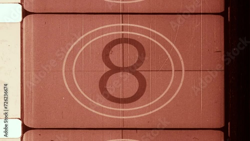 Old 16mm Vintage Film Countdown with Grain Scratches, Sprockets and Frame Mattes 4K Video Background