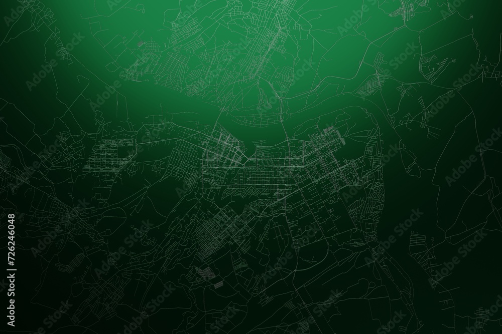 Street map of Kemerovo (Russia) engraved on green metal background. Light is coming from top. 3d render, illustration