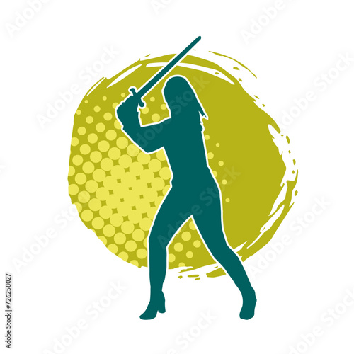 Silhouette of a female fighter in action pose carrying sword weapon.