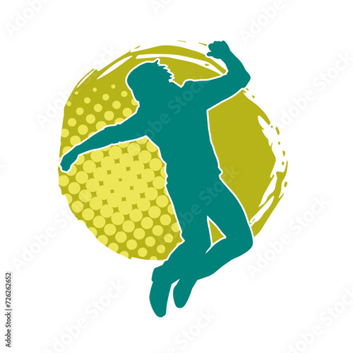 Silhouette of a slim man dancing pose. Silhouette of a male dancer in action pose.