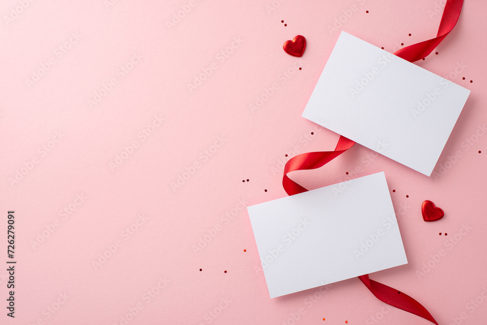 Love note essentials. Top view capturing unused postcards, satin ribbon, heart shapes, and sparkles set against a pale pink backdrop, providing a space for your words or advertisement
