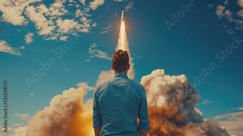 Startup man in blue shirt watching rocket launching to space, Generative AI