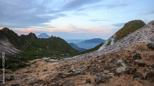 sunset in the mountains. landscape of the peak of Mount Sibayak 