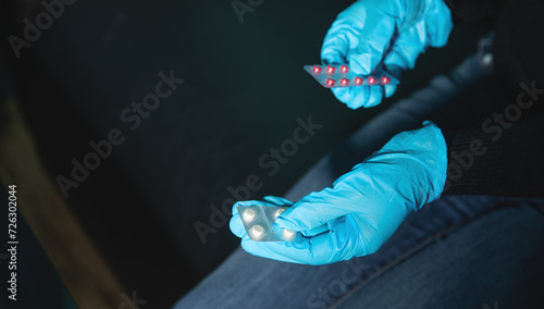 Caucasian female hand showing pill. Healthcare. Medical