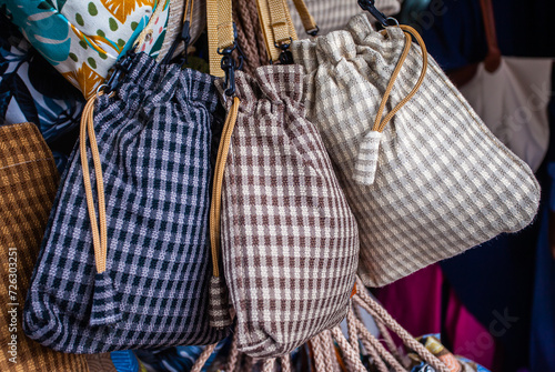 Daily bags produced by small home industries are souvenirs for tourists at the Malioboro Street of Yogyakarta, Indonesia. Malioboro is a popular tourist destination.