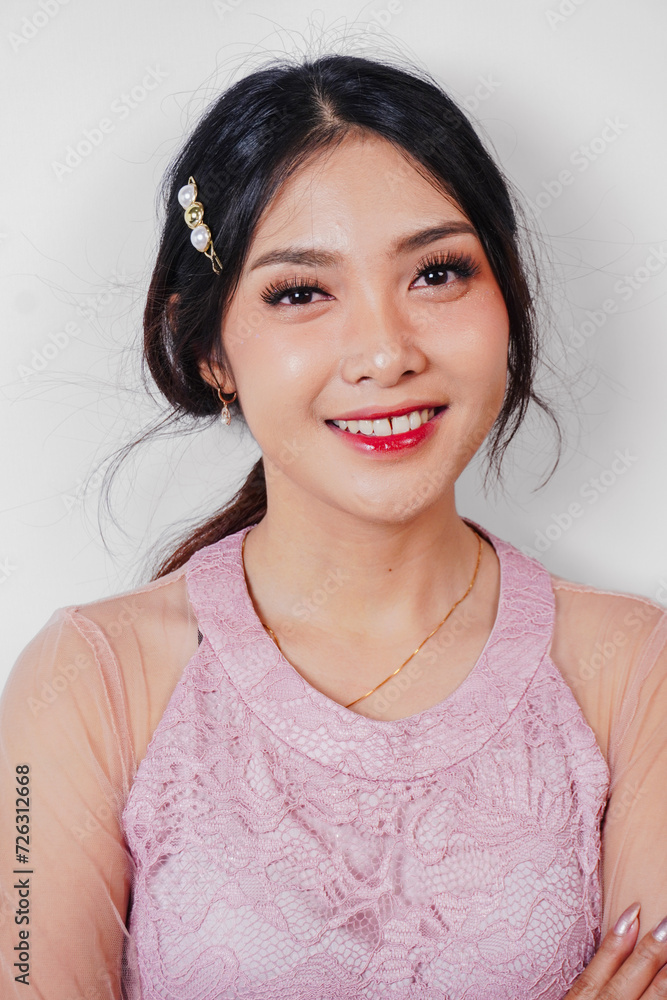 Φωτογραφία Portrait of a young beautiful Asian woman wearing a pink dress, beauty shoot con