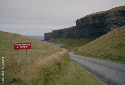 Sign on a rural road warning that it will be closed for surface dressing photo