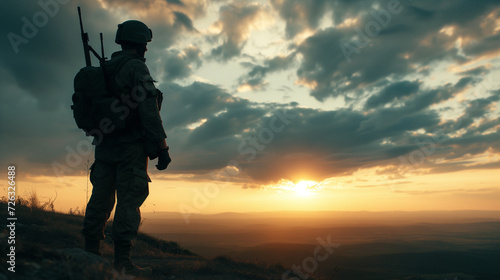 Lone heroic soldier silhouette standing watch, vast and open battlefield in the background