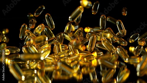 Flying Pills Tablet Capsules Isolated on Black Background. Medical Concept, Health and Disease. Medical Drug Addiction.