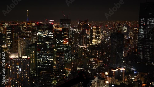Wallpaper Mural Aerial View of Japanese skycrapers from Roppongi, Tokyo, Japan at night. Scenery of central downtown area with Tokyo sky tree and business district. High quality 4k footage Torontodigital.ca