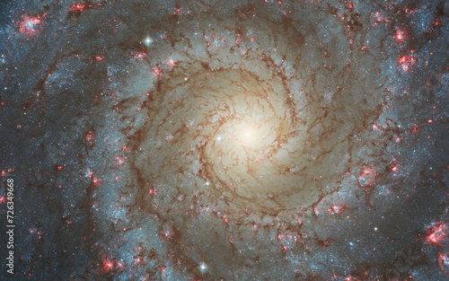 Fototapeta Naklejka Na Ścianę i Meble -  Face-on spiral galaxy, NGC 628. Bright galactic long-range captured imagery. Elements of this image furnished by NASA (observed by the Hubble telescope)