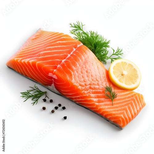 Fresh raw salmon fish fillet, herbs and lemon on isolated background 