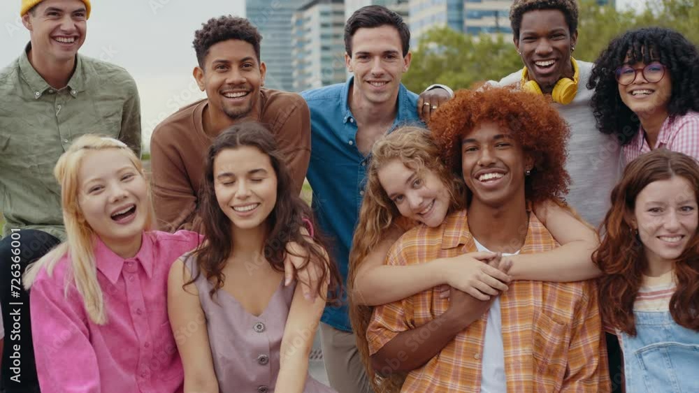 Multiethnic group of teenagers hanging out in the city center. Concepts about campus university students, friendship, and generation z Multiethnic group of teenagers hanging out in the city center. Concepts about campus university students, friendship, and generation z
