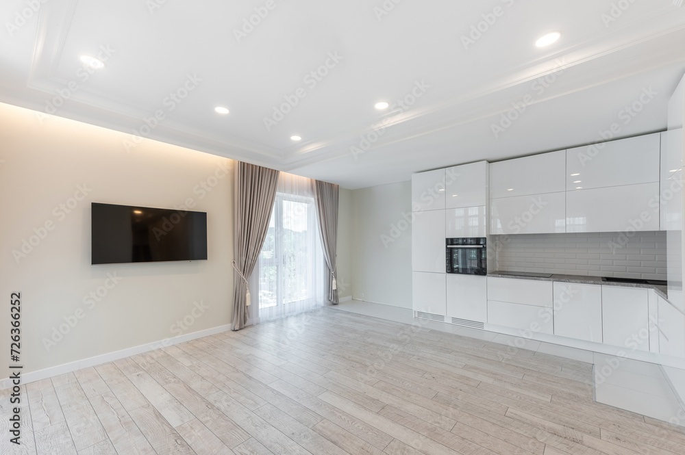 Obraz premium Living room with kitchen and empty space. Home interior with TV
